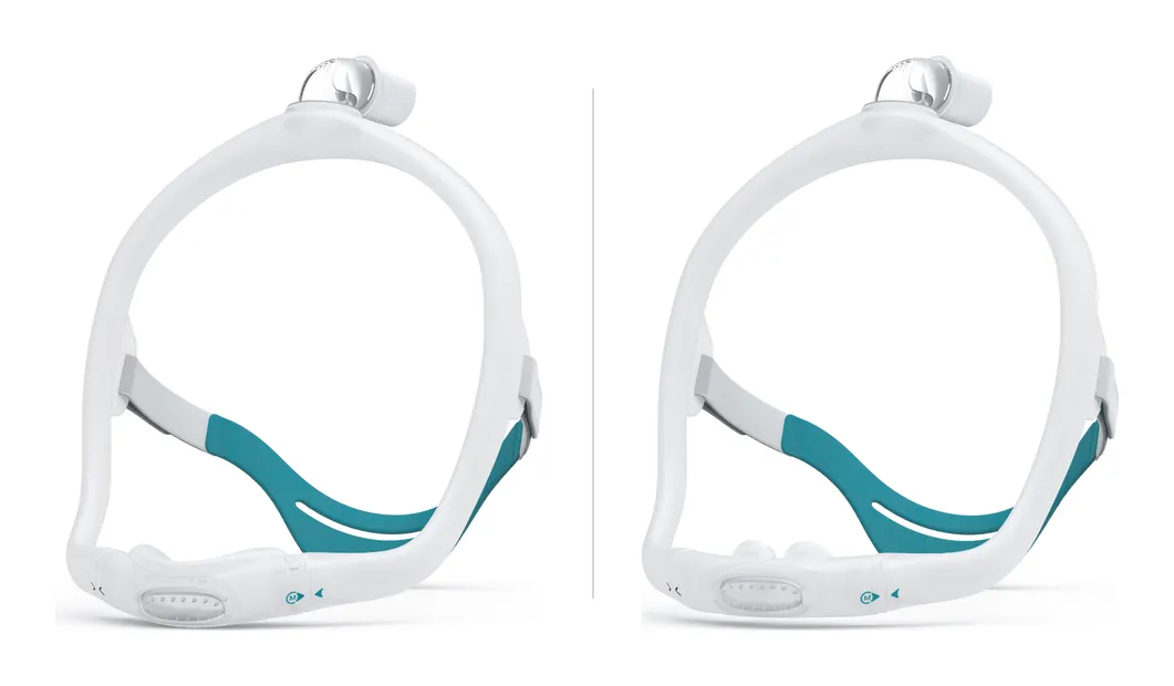 As duas máscaras da BMC lado a lado, com o mesmo headgear de silicone e conexão no alto da cabeça: à esquerda a N6S, nasal que apoia embaixo do nariz, e à direita a P6S, pillow com as duas pontas que entram nas narinas